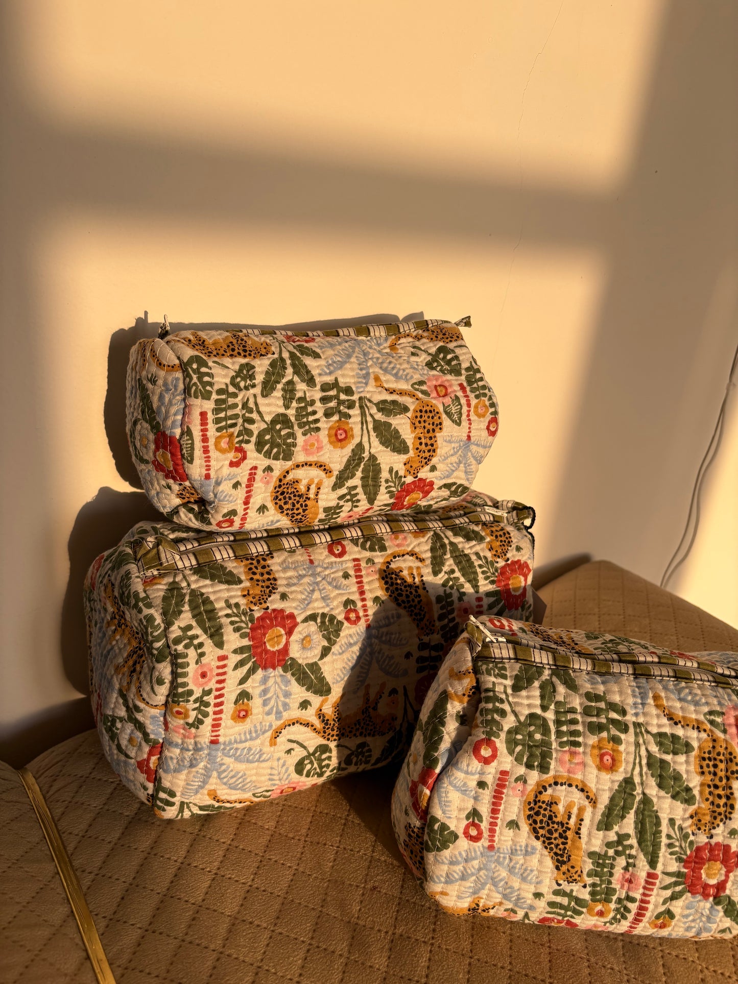 Multi colour tropical print pouches