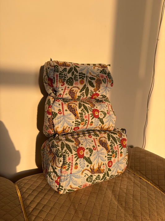 Multi colour tropical print pouches